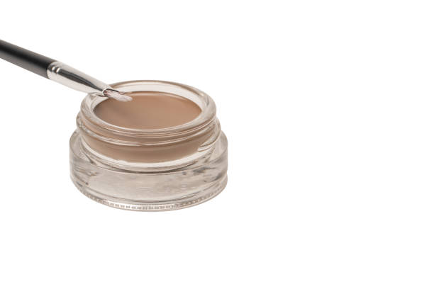 istock A brow pomade in blonde shade with brush isolated on a white background. 1484867970