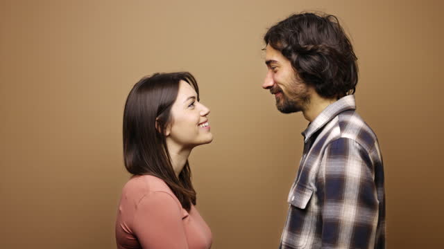 Romantic mid adult couple looking at each other