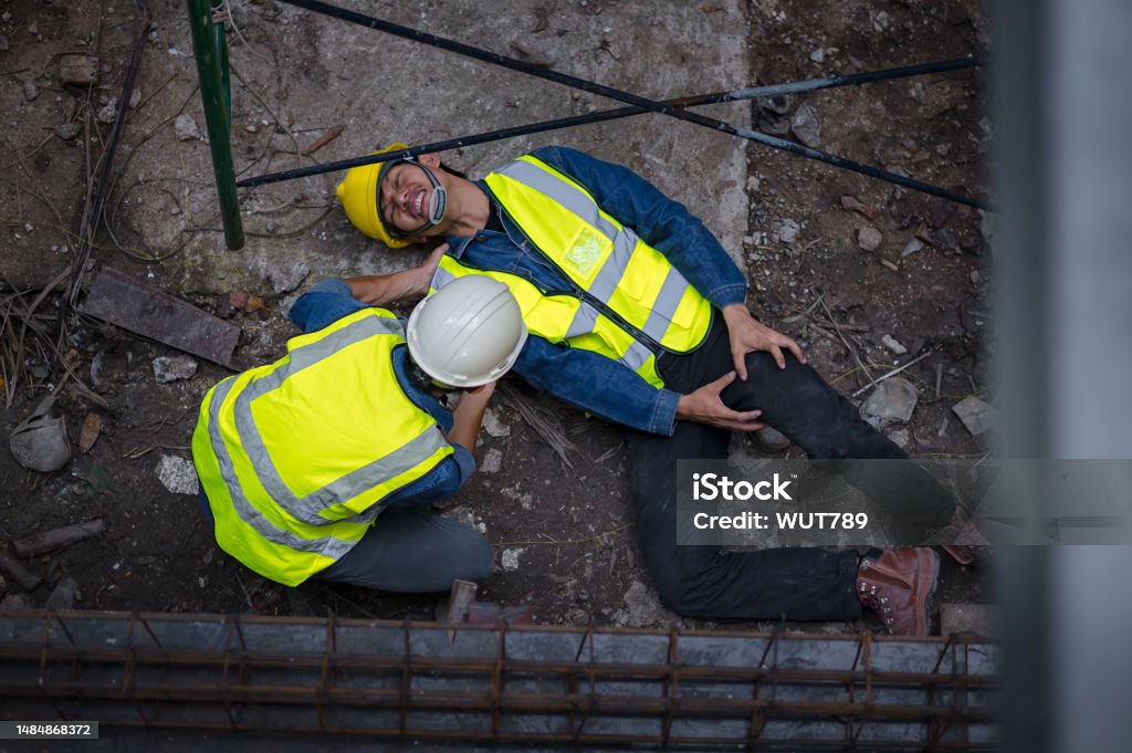 Fall In Building A Young Asian Builder Falls From A Scaffold At A Construction Site An ...