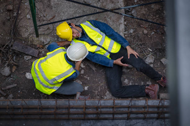 istock A young Asian builder falls from a scaffold at a construction site. An engineer supervising the construction came to the aid of a construction worker who fell from a height with hip and leg injuries. 1484868373