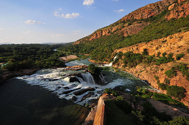Hartbeespoort Dam with dramatically lit hills behind