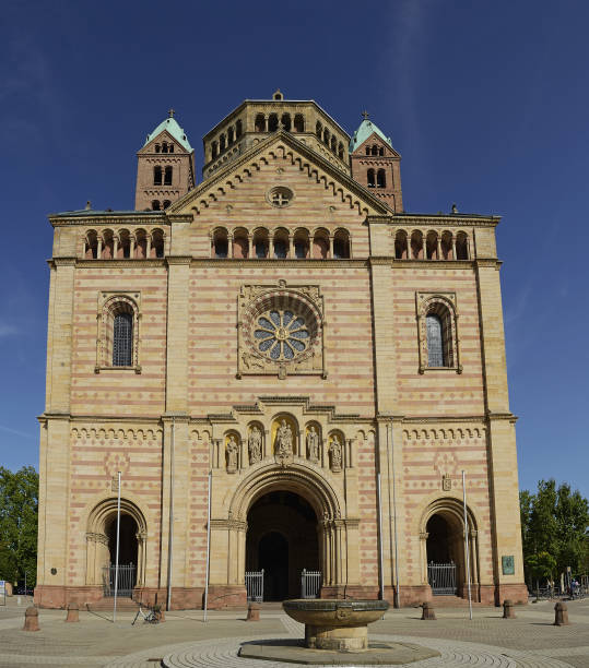 Speyer, Germany - Main entrance, facade and cobbled Dom square (Domplatz) of the famous UNESCO world heritage Speyer Cathedral