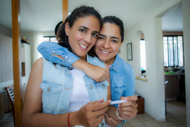 istock LGBT couple with pregnancy test 1484876885