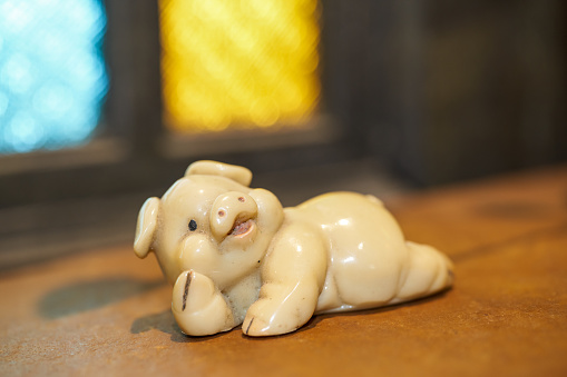 A cute ceramic piggy ornament