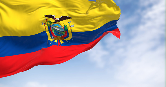 Close-up view of the Ecuador national flag waving in the wind. The Republic of Ecuador is a presidential republic of South America. 3d illustration render. Fluttering fabric