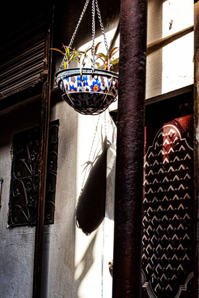 istock Ceramic vase hanging in a street in old Lahore 1484883217