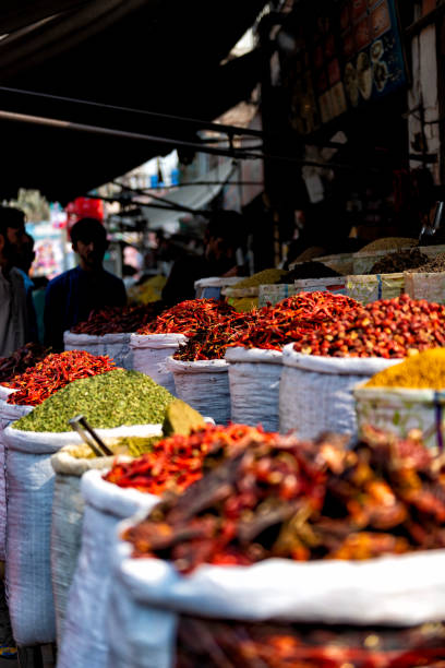 istock Sacs with colorful spices in a market 1484883426