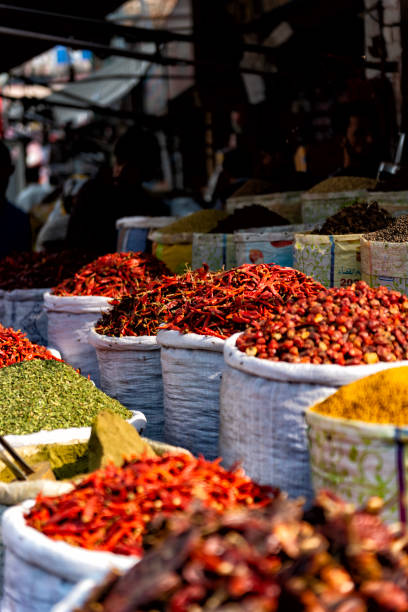 Sacs with colorful spices in a market