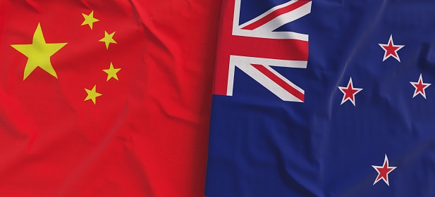 Flags of China and New Zealand. Linen flags close-up. Flag made of canvas. Chinese flag. Beijing. Wellington. State national symbols. 3d illustration.
