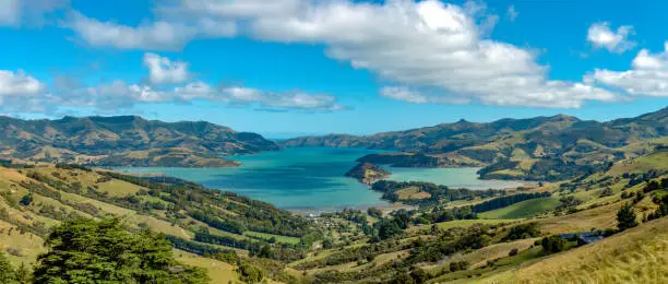 Photo of Akaroa on Banks Peninsula in the Canterbury Region of the South Island of New Zealand. The area was also named Port Louis-Philippe by French settlers after the reigning French king Louis Philippe I