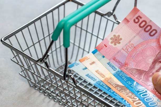 istock Concept, Chile inflation, Empty shopping cart and chile pesos file 1484895096
