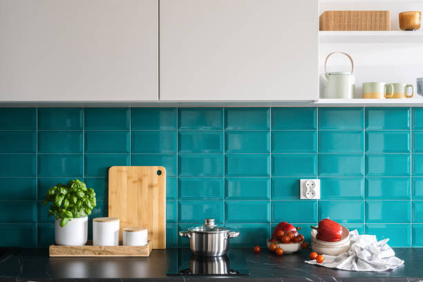 istock cooking pot on electrical hob, basil and vegetable at cozy kitchen 1484897256
