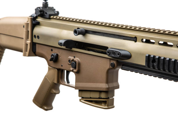 istock Modern automatic rifle isolated on white background. Weapons for police, special forces and the army. Automatic carbine with mechanical sights. FDE assault rifle isolate on white. 1484900641