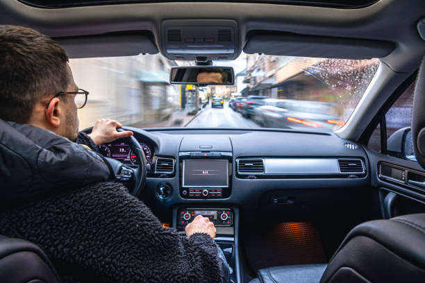 istock Hands on the wheel when driving at high speed from inside the car. 1484920837