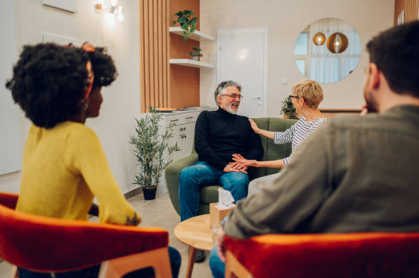 istock Senior people talking about their mental health on a group therapy session 1484923314