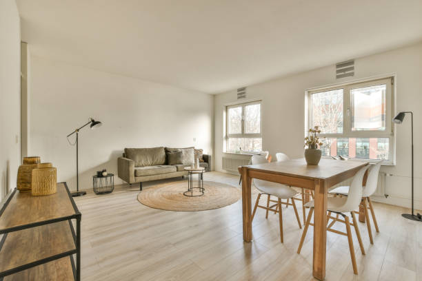 istock a living room with a dining table and a couch 1484924286