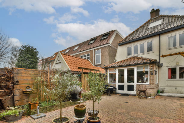 istock the back yard of a house with a brick patio 1484928089