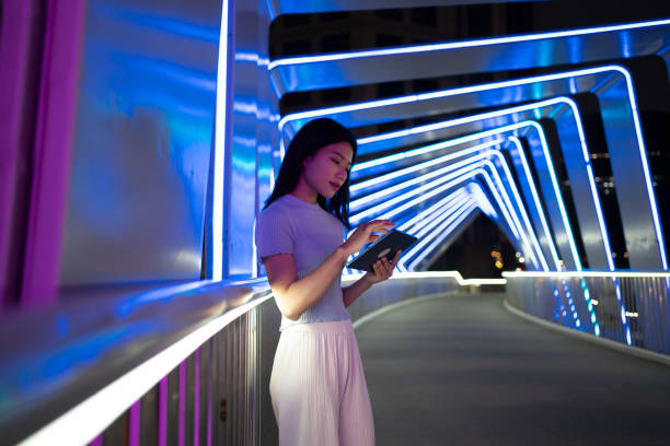 istock Female Businesswomen Using Tablets at Night 1484930606