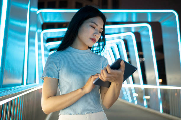 istock Beautiful Women Working on Tablets on Bridges 1484930628
