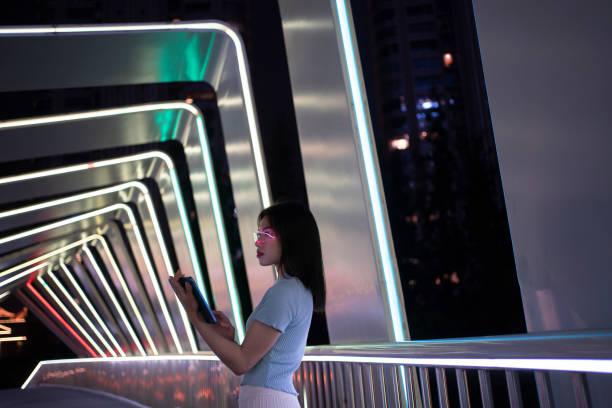 istock Female businessmen at night using virtual reality technology 1484930679