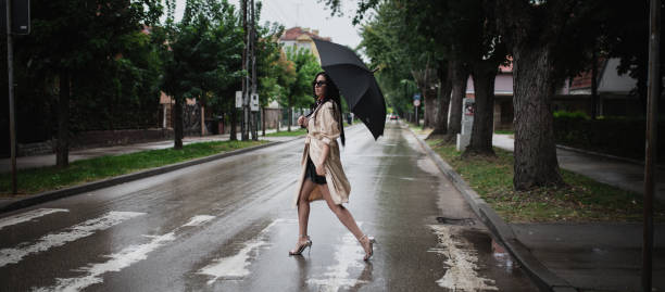 istock A young woman is walking down the street 1484931481