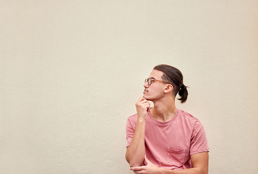 Man, thinking or glasses on isolated background for fashion promotion branding, optometry sales deal or mockup marketing space. Model, student or optician vision ideas for healthcare wellness or eyes