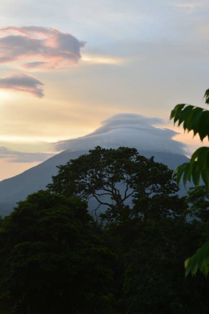 istock Vertical Ometepe volcano with lenticular clouds at sunset, Nicaragua 1484931505