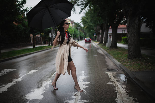 istock A young woman is walking down the street 1484931733