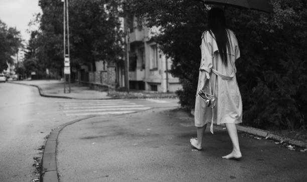 istock A young woman is walking down the street 1484931741