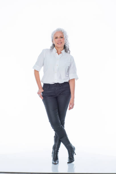 istock mature latin woman looking at the camera that portrays her executively dressed 1484931865