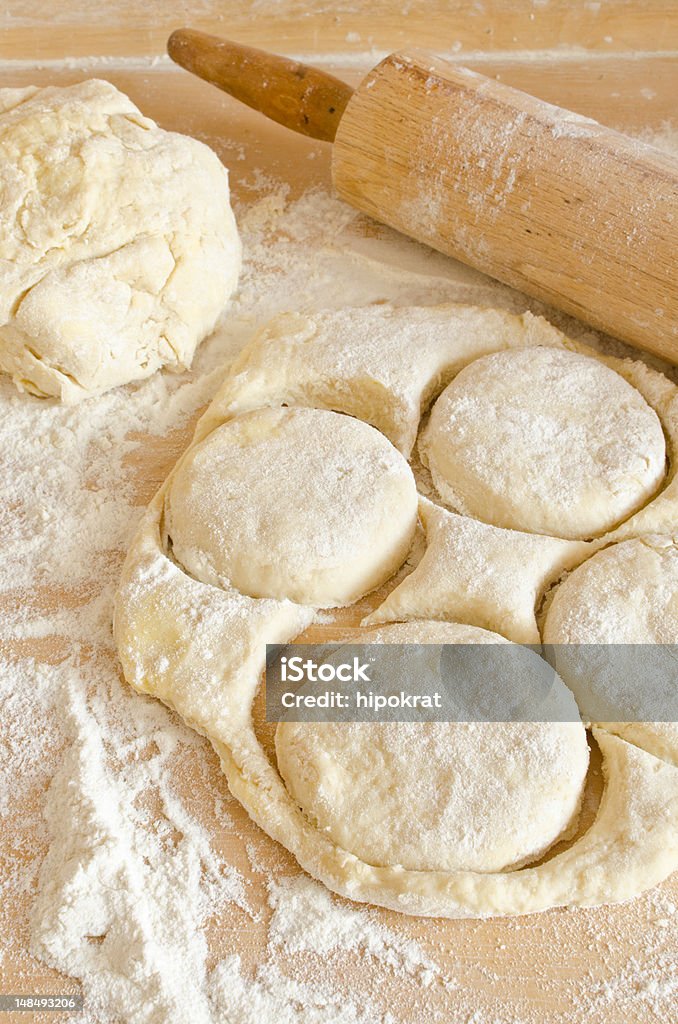 Preparing biscuits Homemade raw biscuits (scones) on board Baked Stock Photo