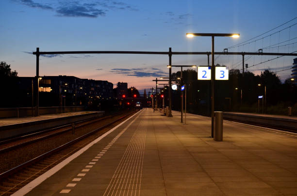 istock Beautiful view of railway platform at night 1484934751