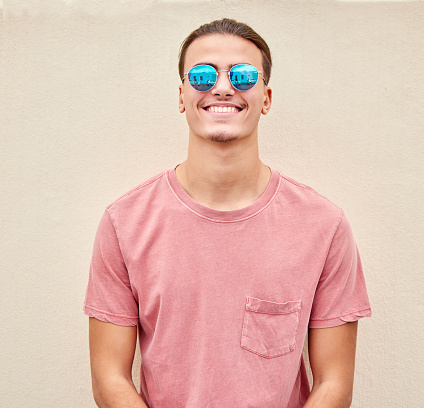 Man, face or fashion sunglasses on isolated background for promotion branding, optometry sales or mockup marketing. Smile, happy or model student and summer optician vision or eye healthcare wellness