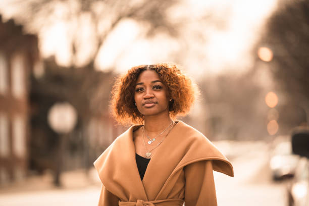 istock Young Black woman walks to office for work 1484944426