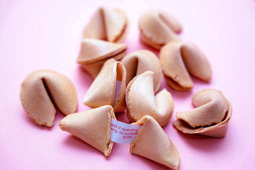 Fortune cookies make a tasty addition to your Chinese New Year party favors and are one of snacks to  celebrate the festivities. 
 The message written on a tiny piece of paper inside the cookie is just for you because  you picked that one out of every single fortune cookie.