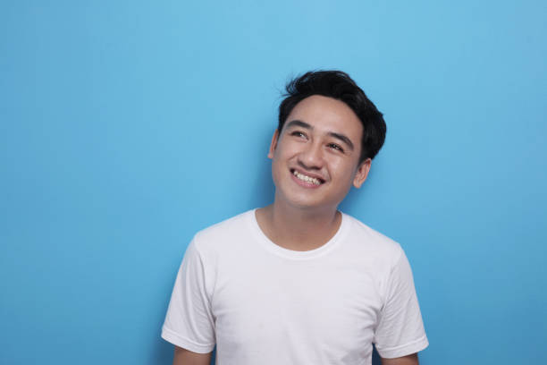 istock Asian man thinking something, looking for good idea 1484946490