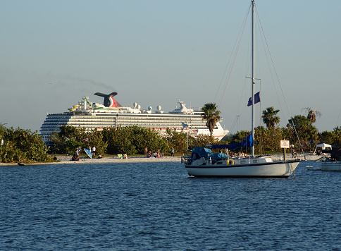 March 2023, Tampa, FL - Gorgeous Tampa Bay offers both cruise ship spotting, yachting and beach at David Island. Carnival ship can be seen sailing