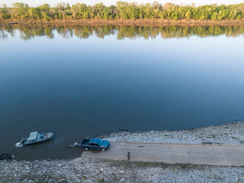 launching a fishing boat at a ramp - sunrise aerial view of Missouri River at Dalton Bottom