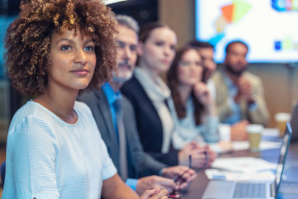 istock Group of people listening to a presentation. 1484955791