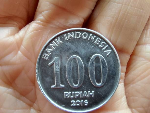 istock Indonesian coins one hundred hundred rupiah (100 rupiah) 1484958151