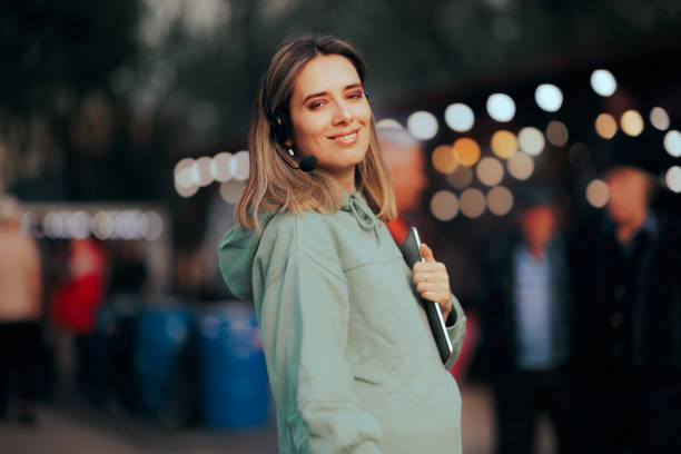 istock Music Festival Organizer Wearing a Headset Holding a Pc Tablet 1484958218