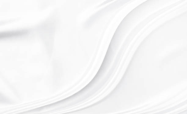 istock White gray satin texture that is white silver fabric silk background with beautiful soft blur pattern natural. 1484958320