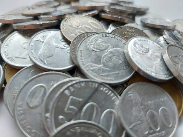 istock Pile of Indonesian rupiah coins 1484958963