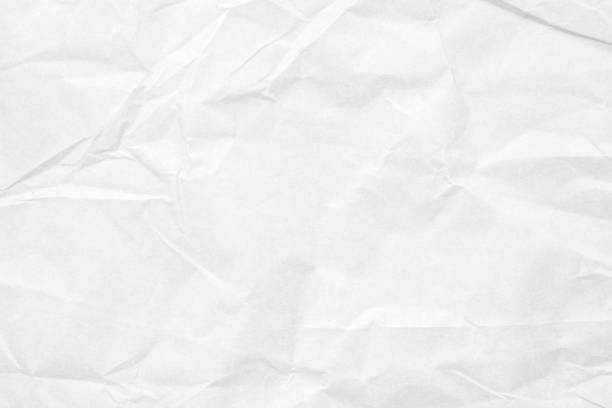 istock Abstract white crumpled and creased recycle paper texture background 1484959304
