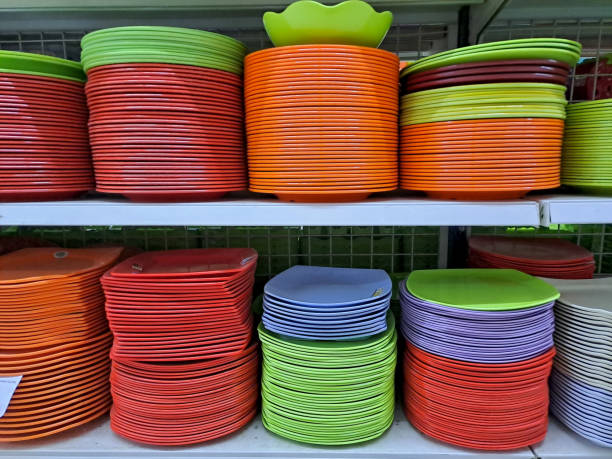 istock Stacks of many multi-colored plates on a rack 1484964120