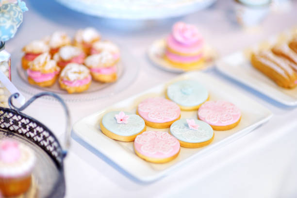 istock Beautiful desserts, sweets and candy table at wedding reception 1484964799
