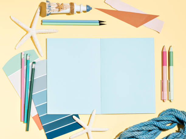 istock Minimal background setting with pastel shades for education or business. Compositions of summer decorations, stationary and colour swatches. Template for a study planner, art sketchbook or writing. 1484969294