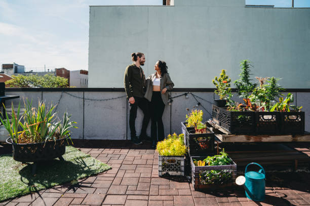 istock A couple is talking together on a rooftop terrace 1484970793
