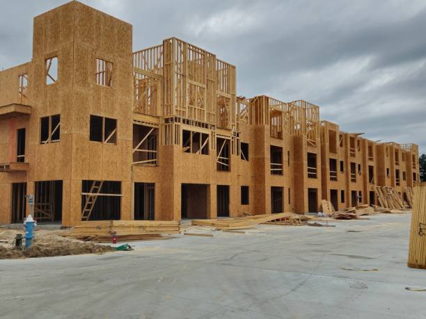 istock Wood Frame of Apartment Building Under Construction 1484970844