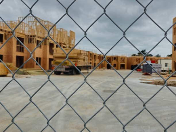 istock Wood Frame of Apartment Building Under Construction 1484971037